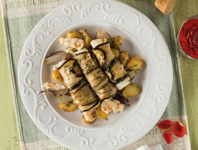 Involtini al forno di fiori di filetto di merluzzo e gamberi