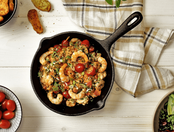 Saganaki di gamberi, pomodorini e feta